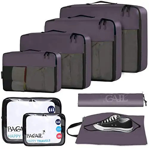 8 packing cubes set in dark grey for organized travel, includes clear bags and shoe bag for efficient luggage packing.