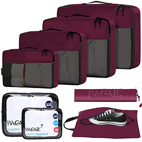8 set packing cubes in burgundy, including clear bags and shoe bag, for organized travel and luggage storage solutions.