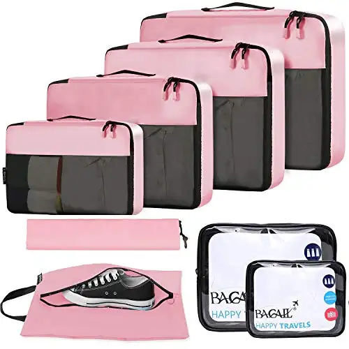 8 set packing cubes in pink with clear bags and shoe bag, perfect for travel organization and luggage management.