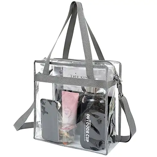 Clear stadium-approved tote bag, crossbody messenger style, adjustable strap, durable design for events and everyday use.