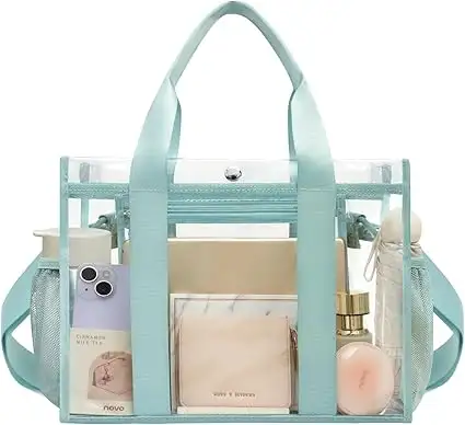 Clear tote bag, stadium approved, crossbody messenger style with adjustable strap, perfect for events and daily use.