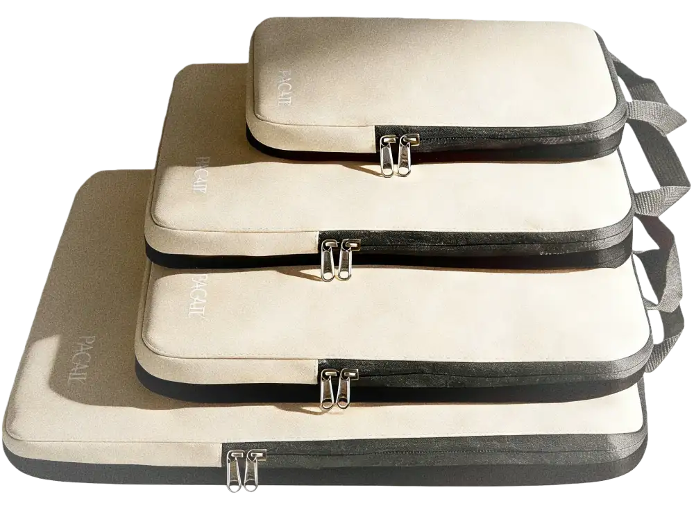 Expandable 4 set compression packing cubes for organized travel, featuring durable fabric and efficient storage design.