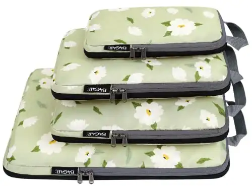 4 set compression packing cubes in green floral design, ideal for travel organization and space-saving packing.