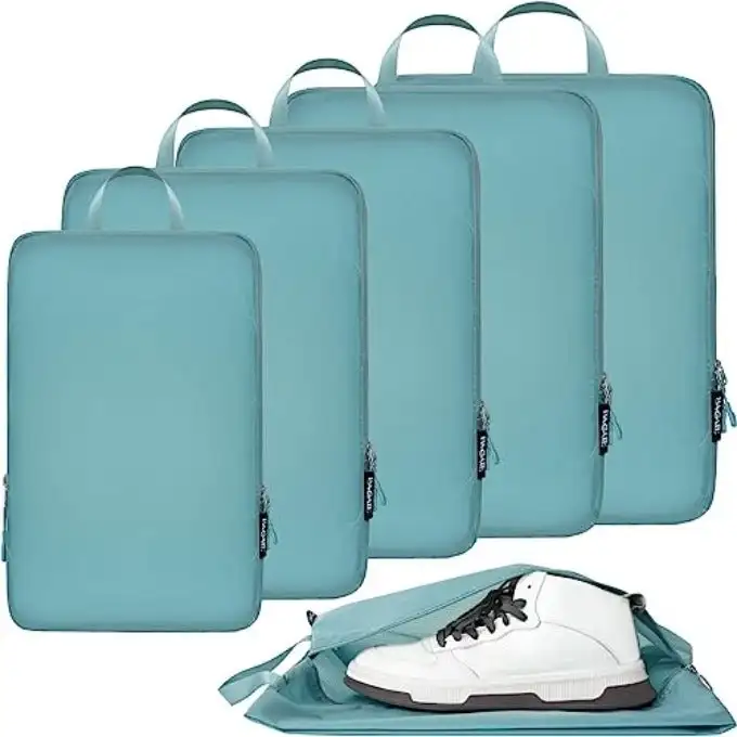 Ultralight compression packing cubes set with water-resistant design and shoe bag for camping and hiking storage solutions.