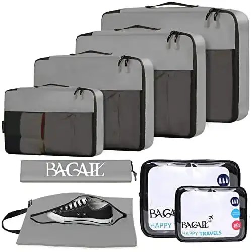 8 packing cubes set for luggage organization, includes clear bags and shoe bag for efficient travel packing.