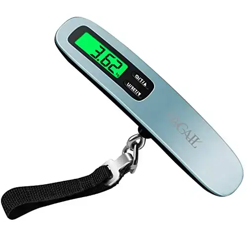 Digital metal luggage scale with LCD display, max capacity 110 lbs, compact design for travel convenience.