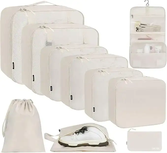 10 set mesh packing cubes in various sizes with laundry bag, makeup bag, and zipper pouch for organized travel.