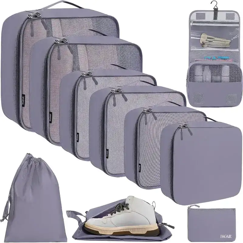 10 mesh packing cubes set in various sizes with laundry bag, makeup bag, and zipper pouch for organized travel.
