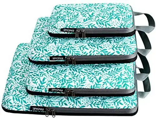 4 compression packing cubes set for travel, expandable design, lightweight organizers for efficient packing and storage.