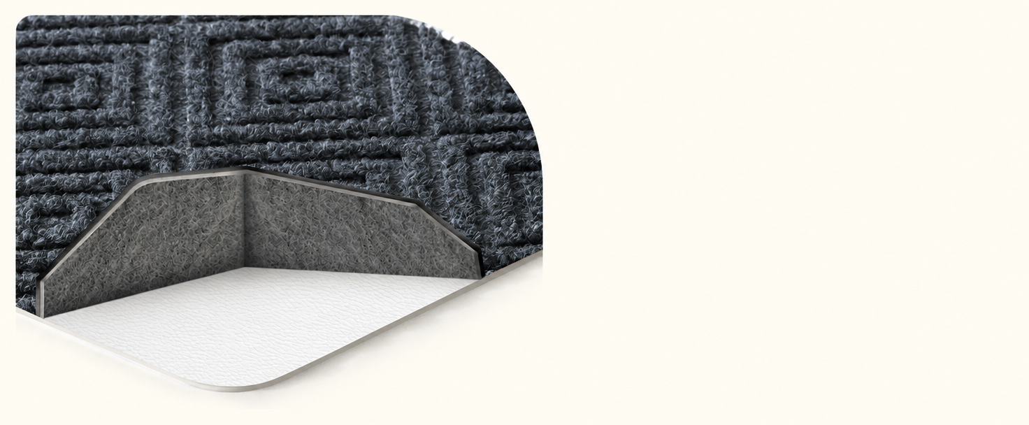 Close-up cross-section showing the surface, felt core and backing layers of a stair tread