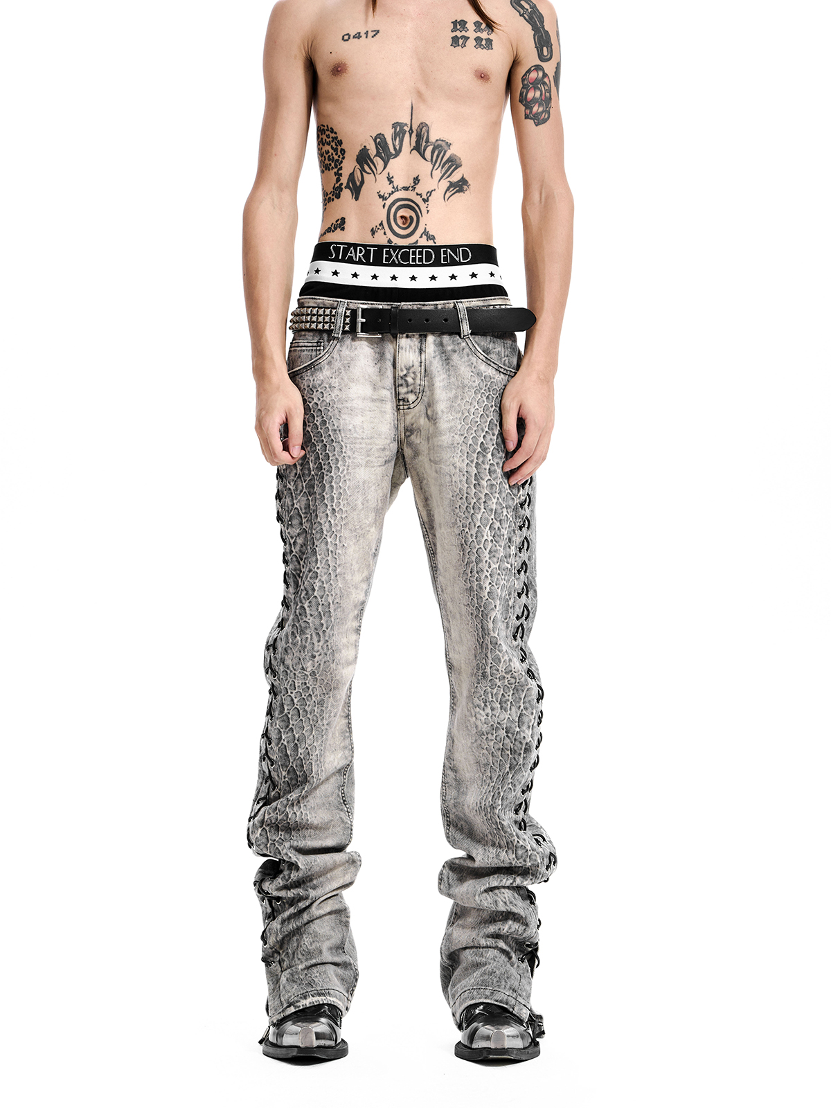 SNAKE PRINT LACE-UP STACKED JEANS