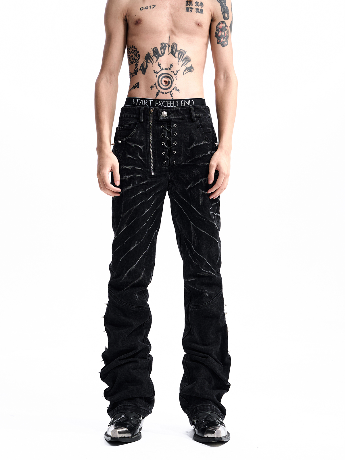 STUDDED ASYMMETRIC FLY JEANS