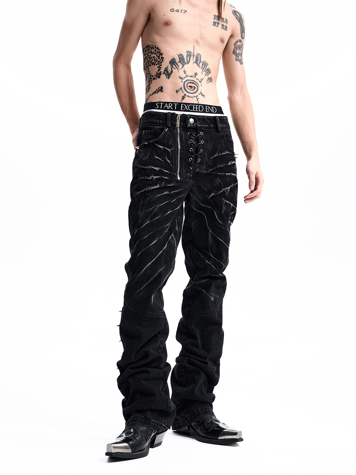 STUDDED ASYMMETRIC FLY JEANS