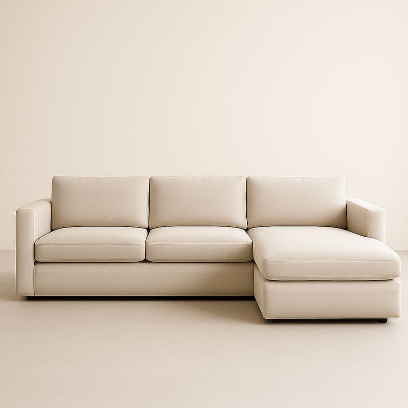 Divano angolare in tessuto beige con chaise longue