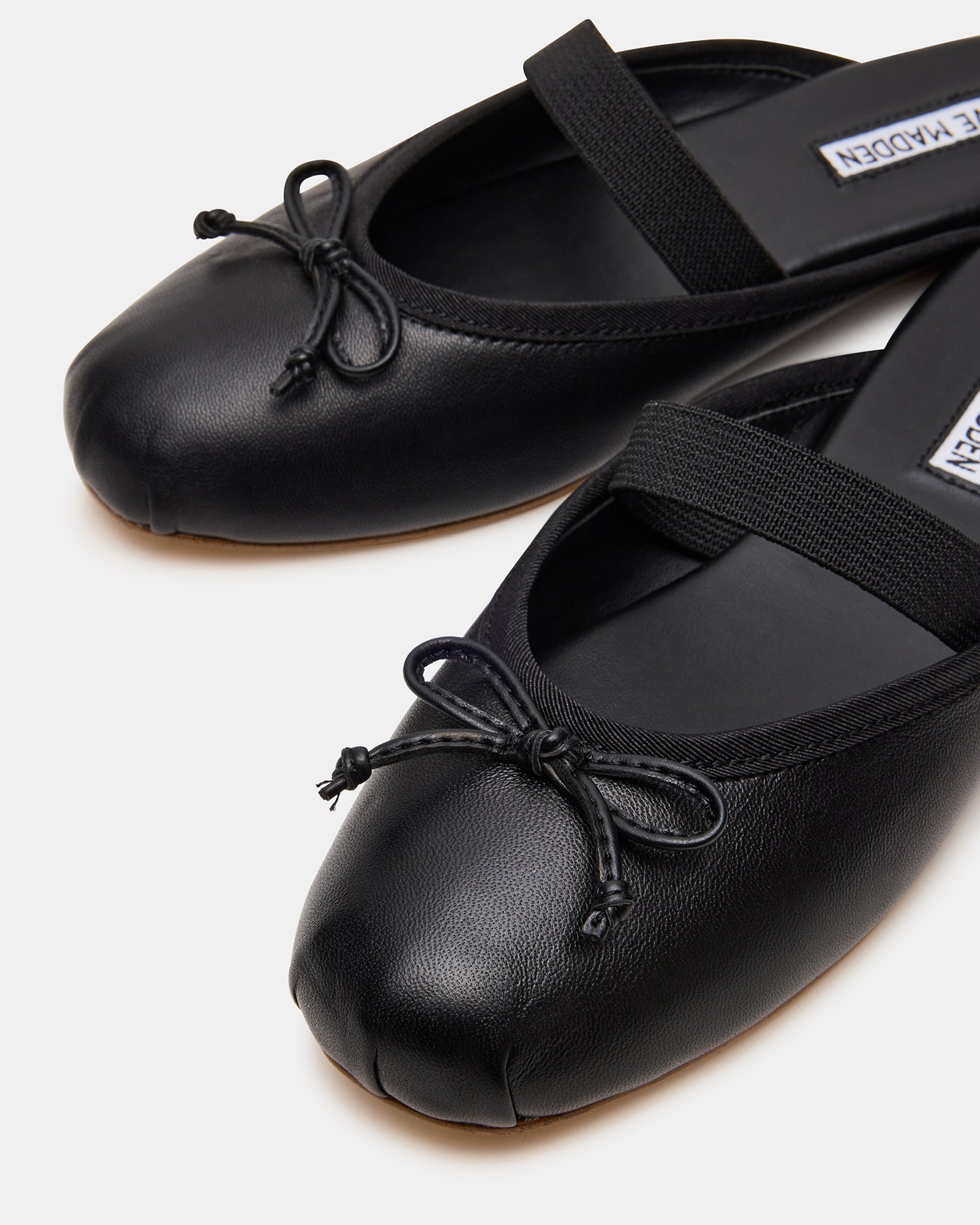 CUTESY BLACK LEATHER-Cool A Warm