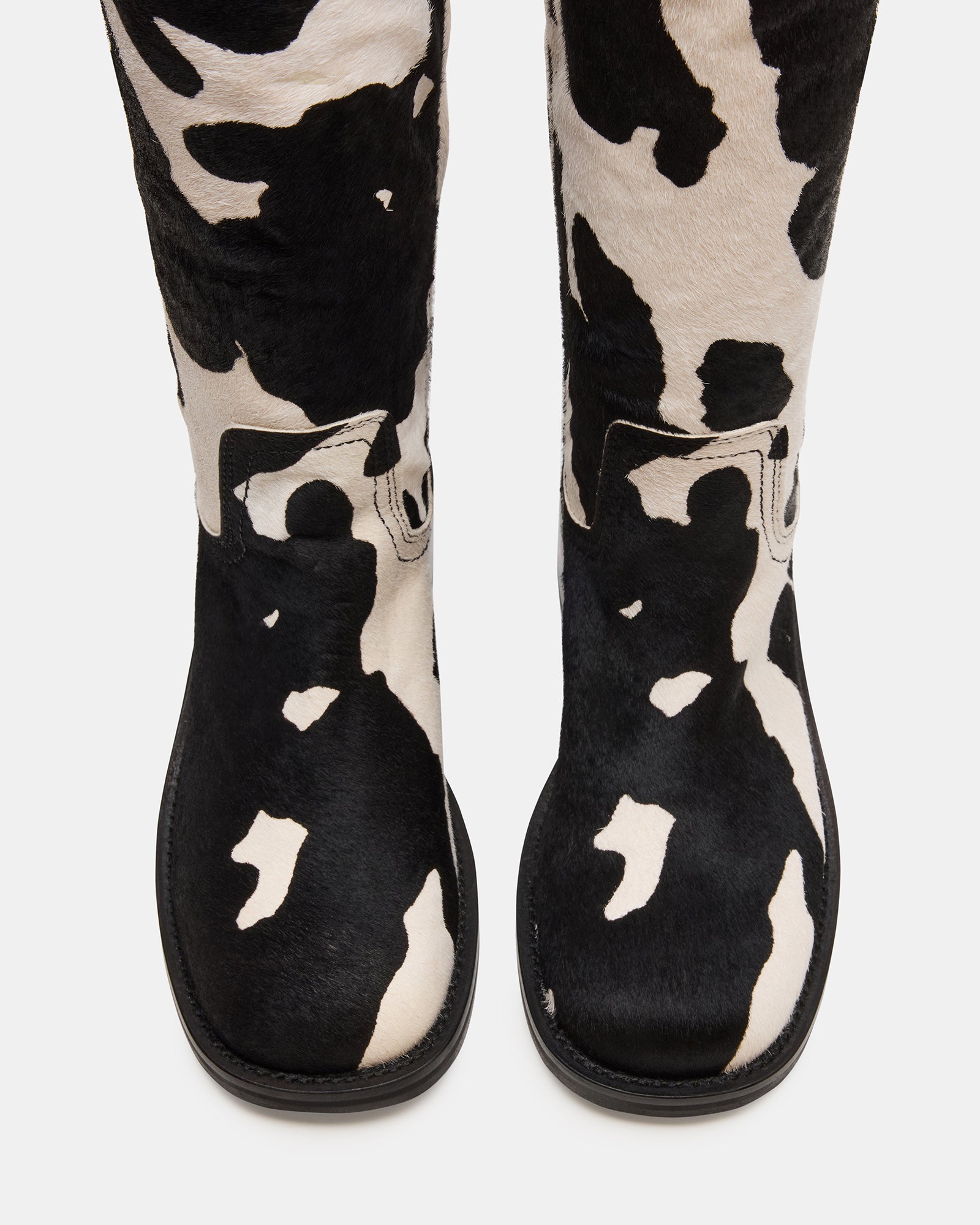 RIGGS BLACK COW PRINT WIDE CALF-Cool A Warm