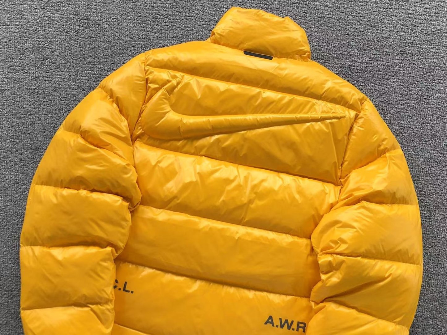 Nike x Nocta Puffer Yellow