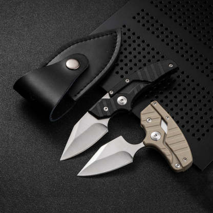 Detail of versatile transformable folding knife shown on black desk