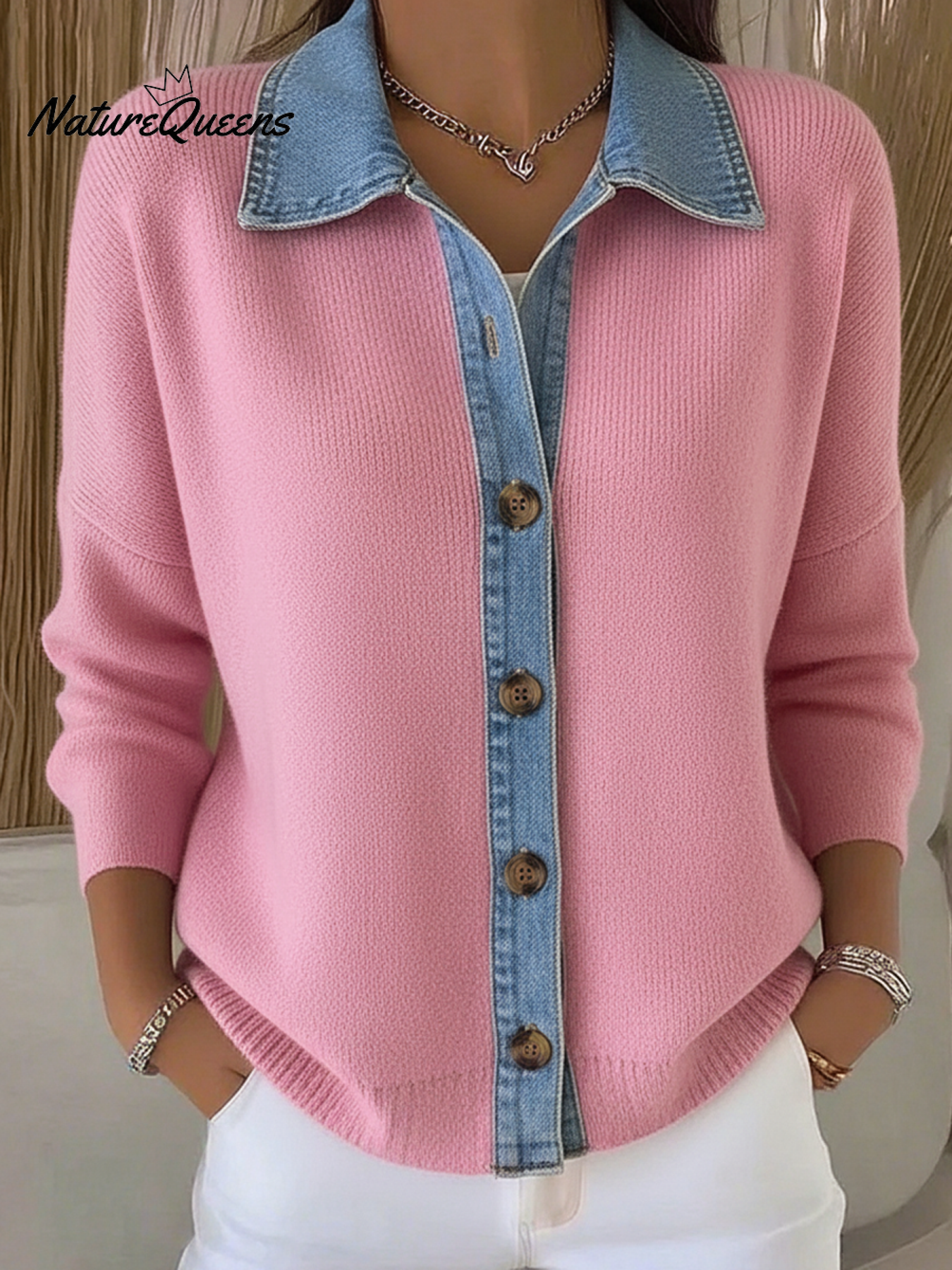 Knitted cardigan sweater in a denim style with a polo collar and buttons.