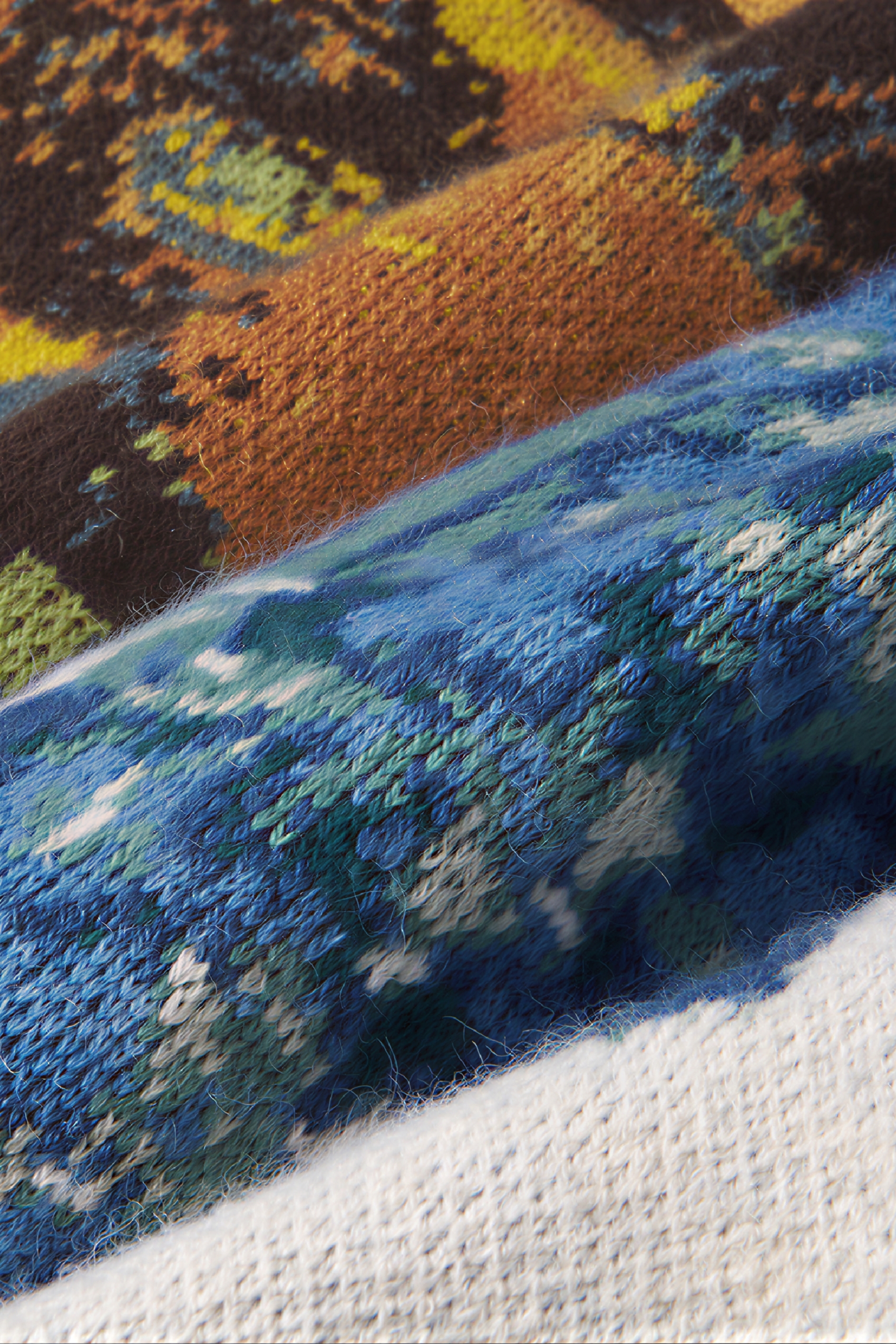 Vintage-style outer layer paired with a knitted sweater