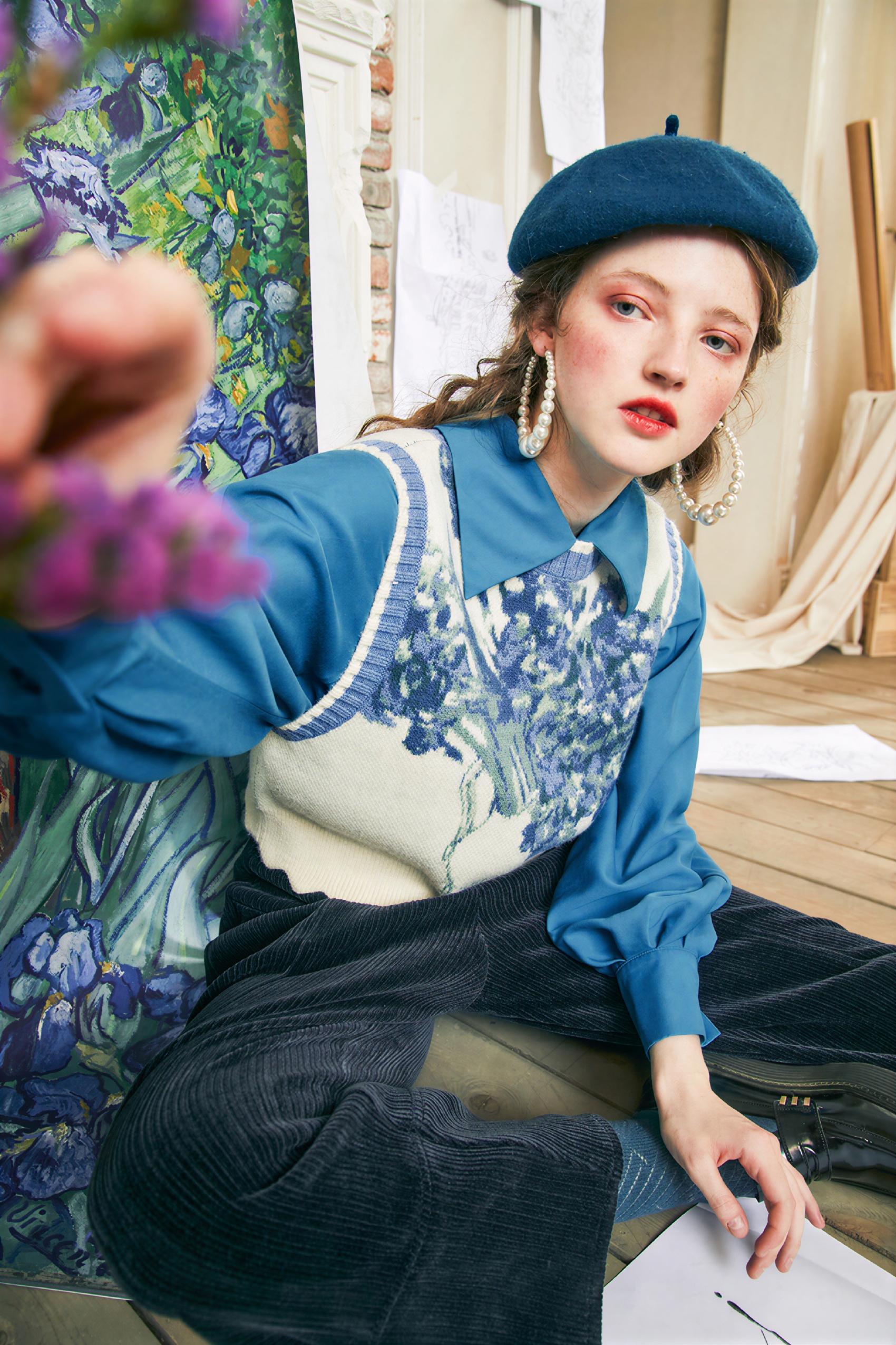 Vintage-style outer layer paired with a knitted sweater