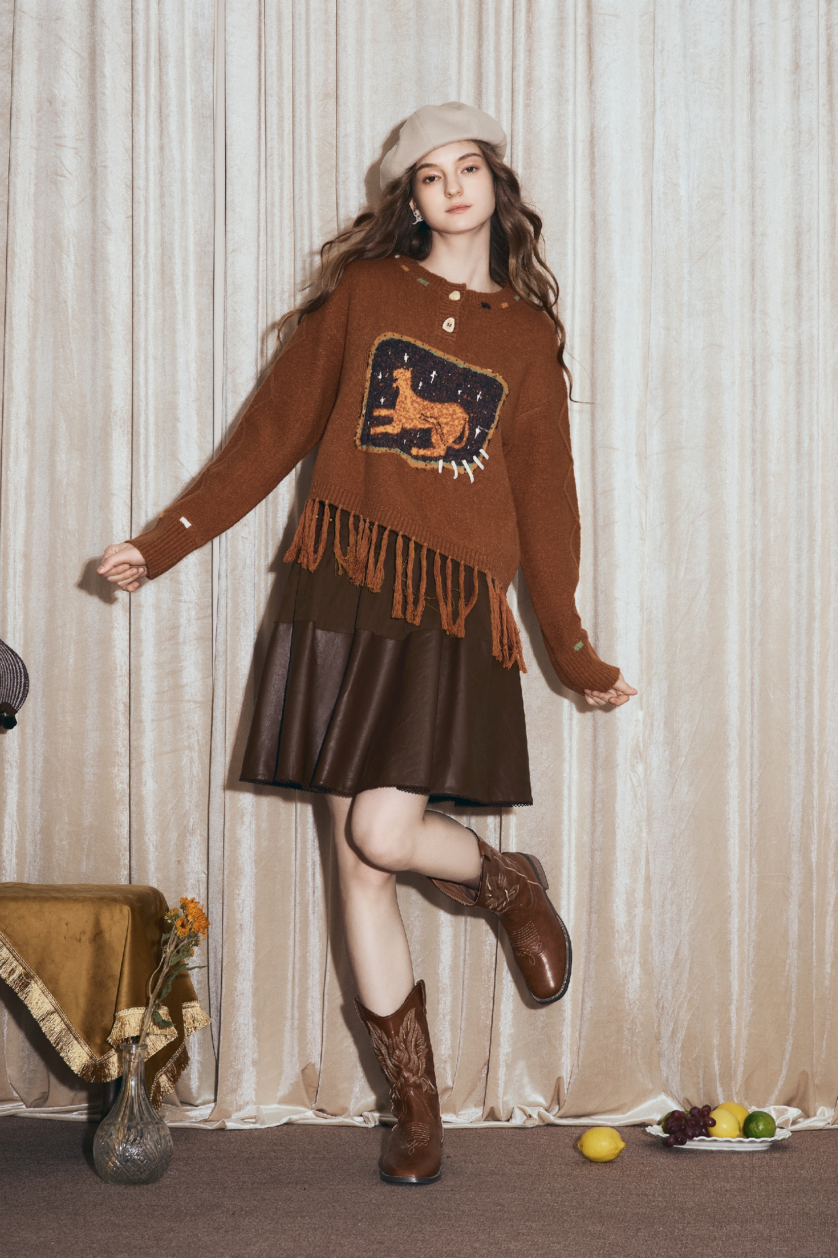 Round-neck jacquard sweater with tassels