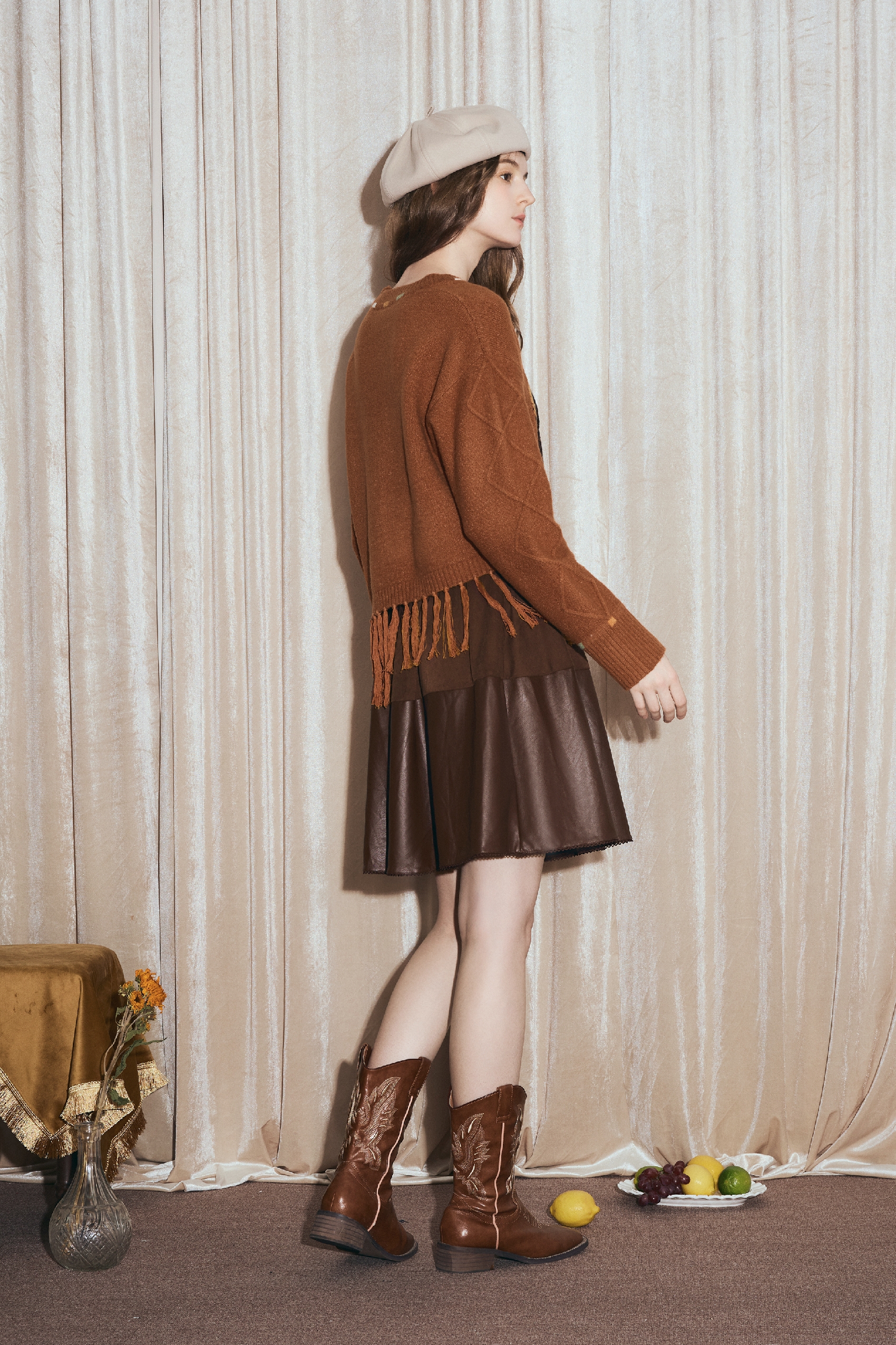 Round-neck jacquard sweater with tassels