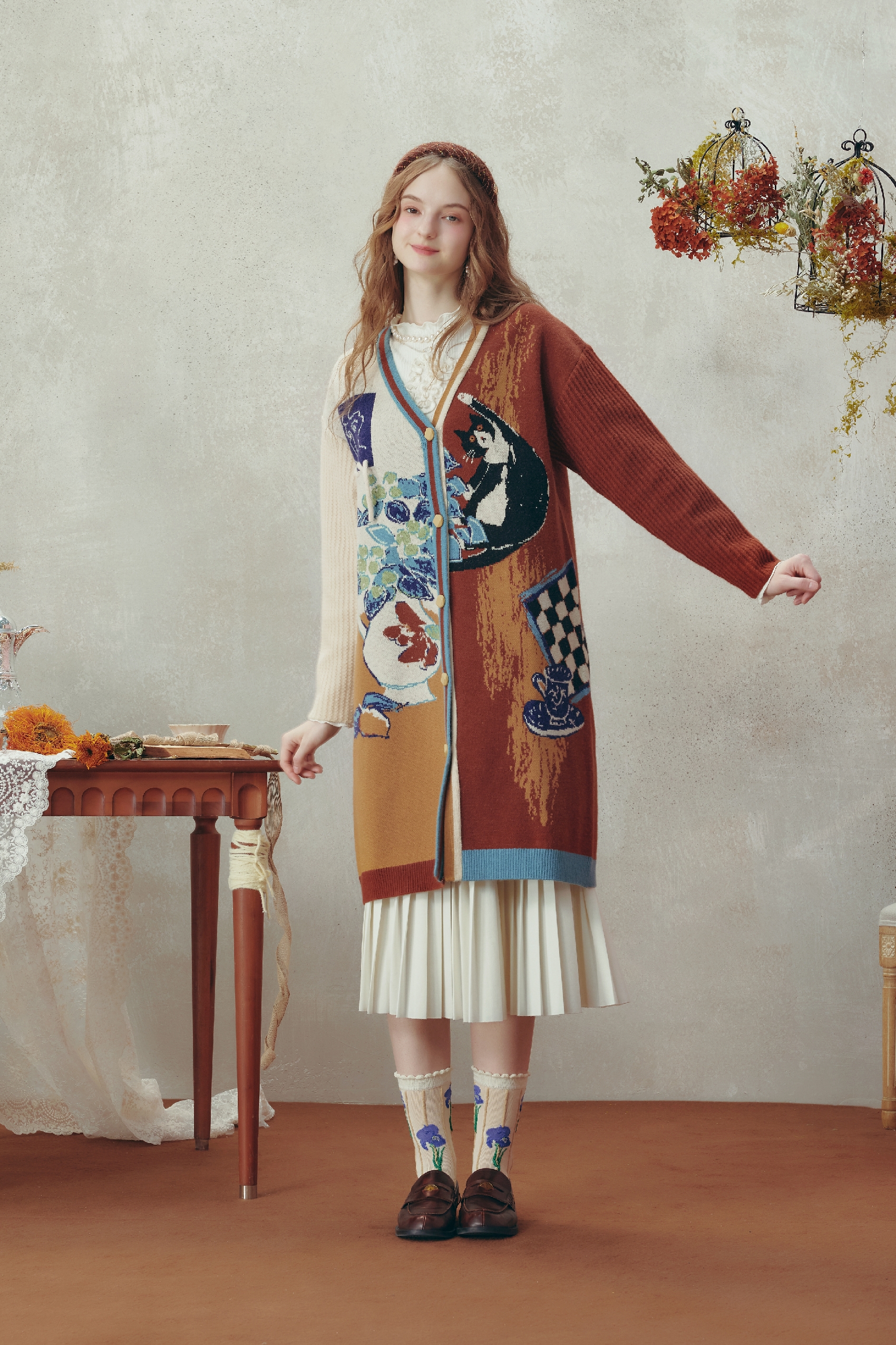 Medium-length knitted cardigan