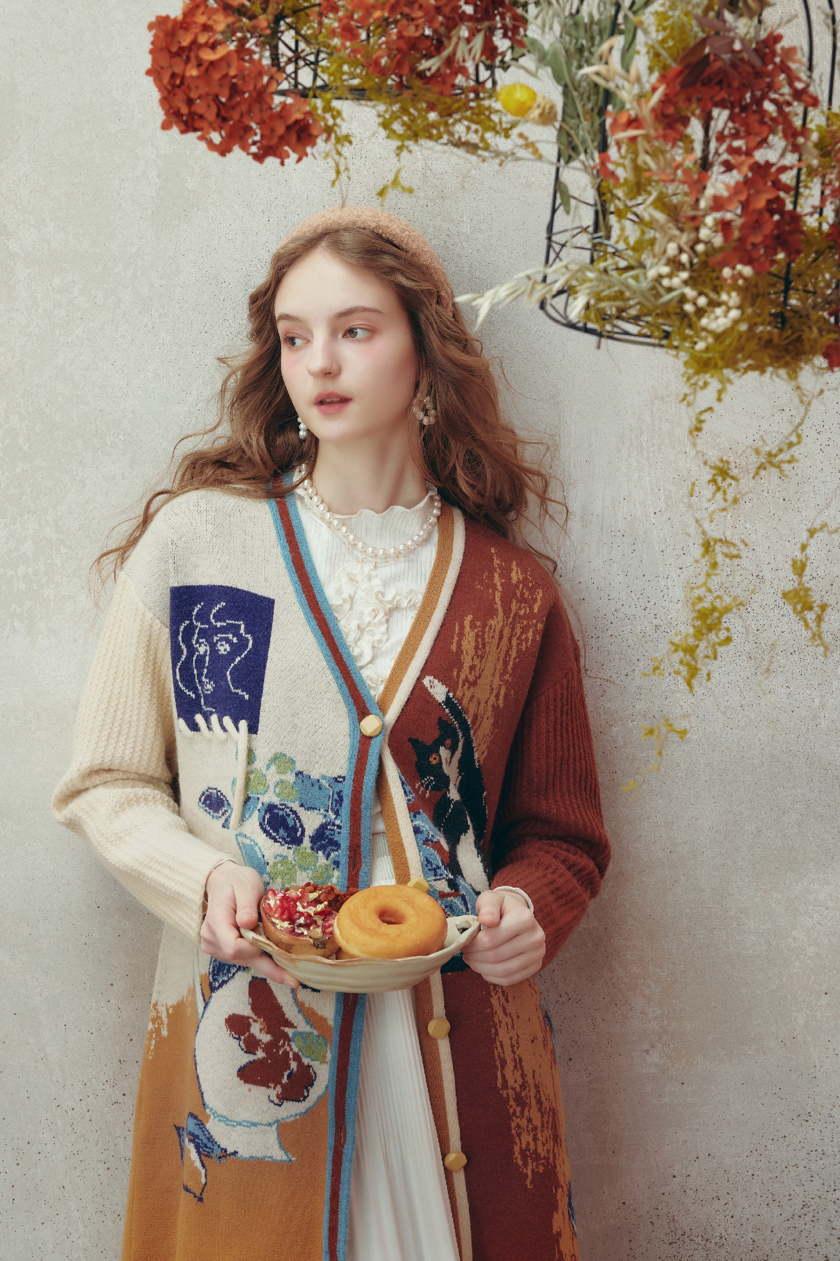 Medium-length knitted cardigan