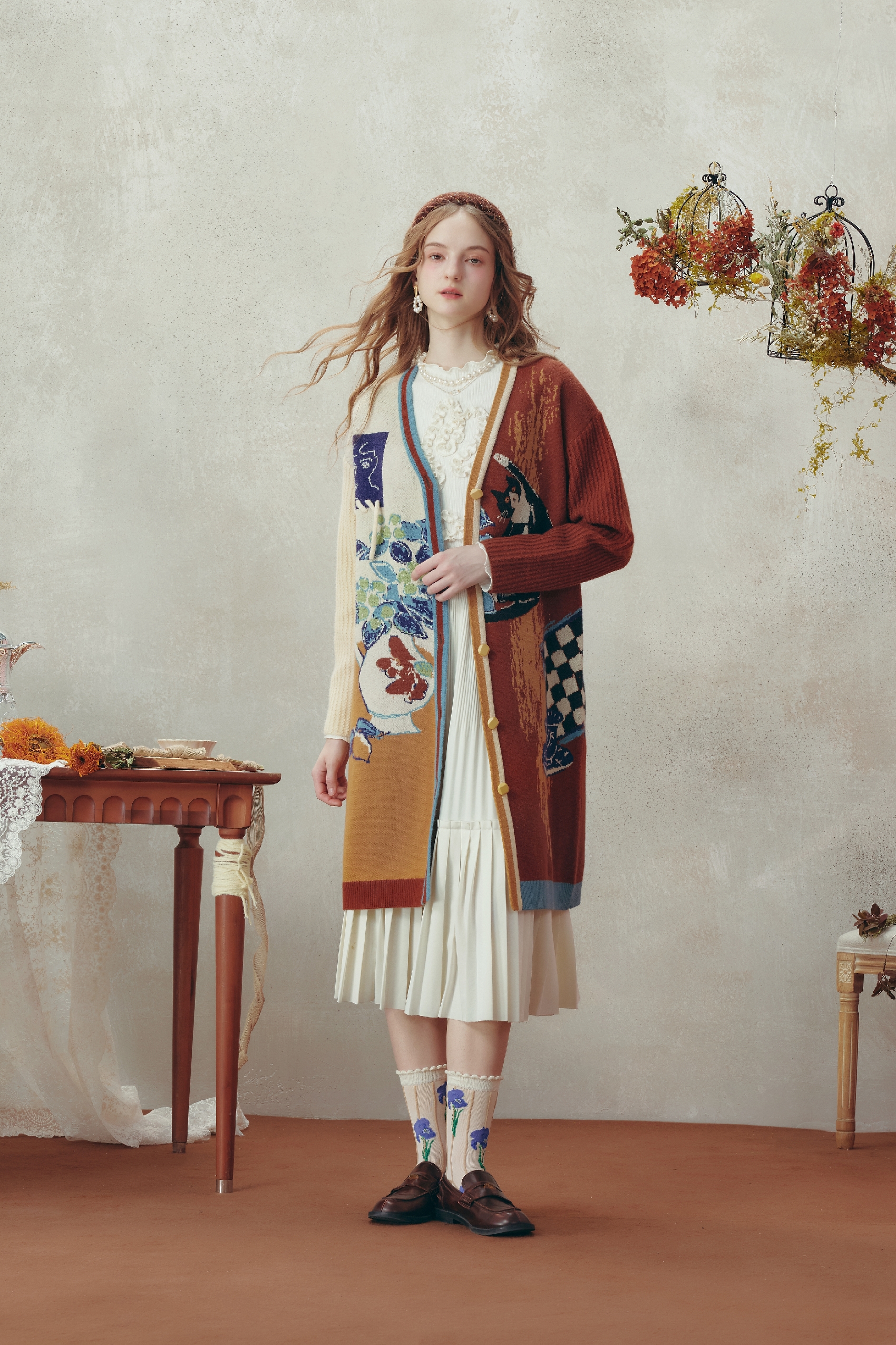 Medium-length knitted cardigan