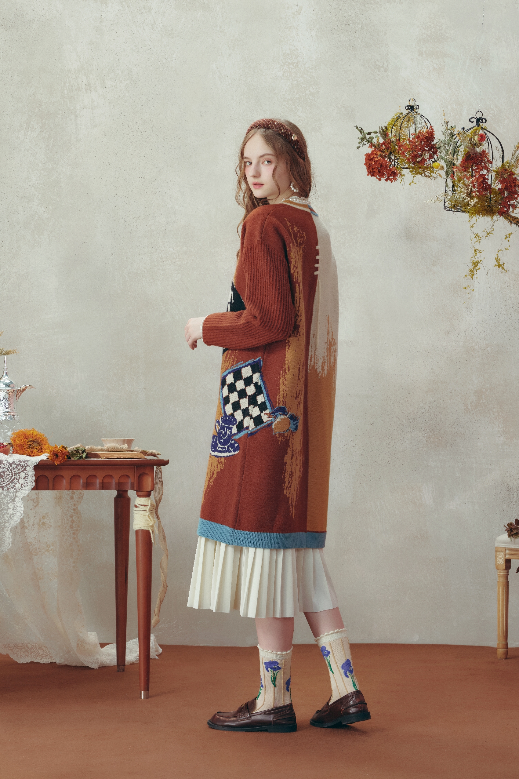 Medium-length knitted cardigan