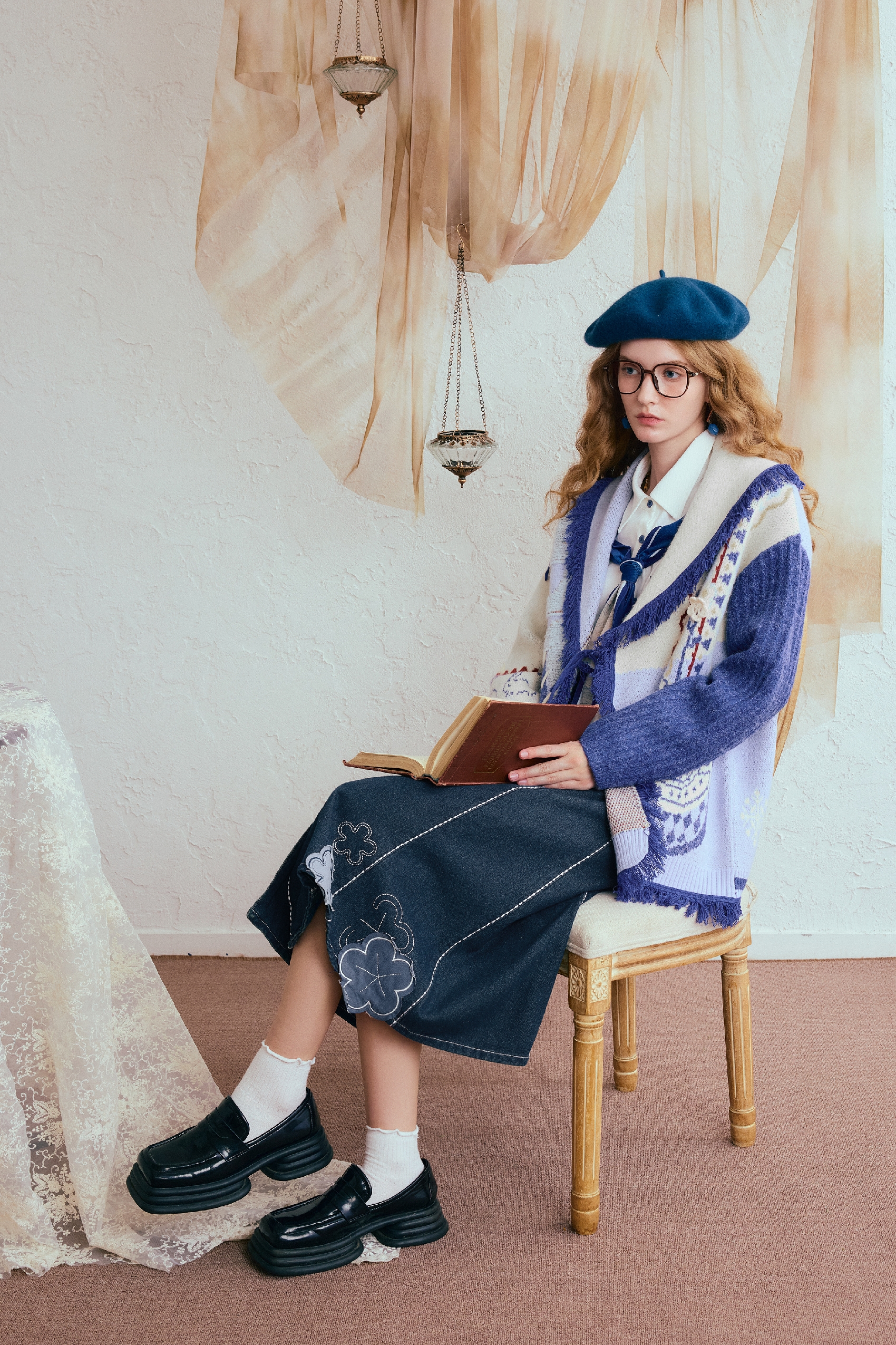 Blue loose-fitting knitted cardigan