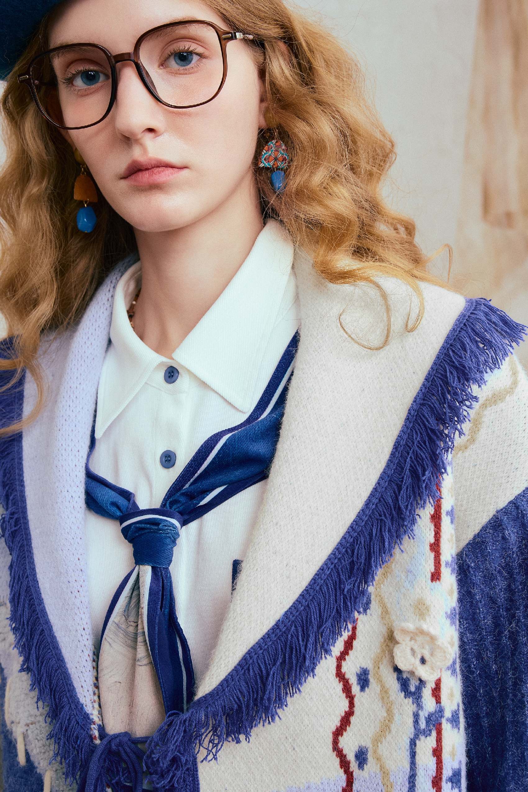 Blue loose-fitting knitted cardigan