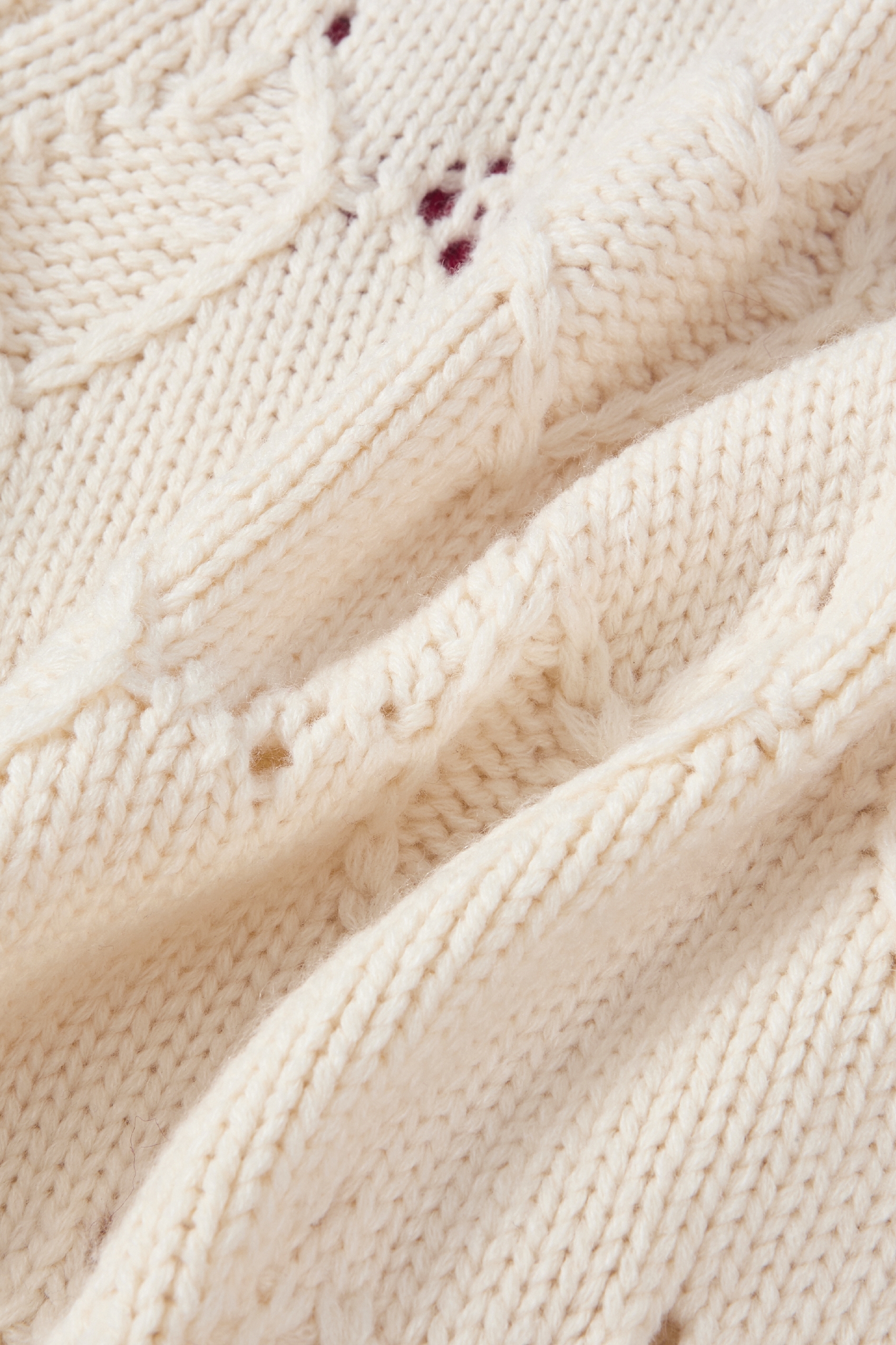 White openwork knit sweater