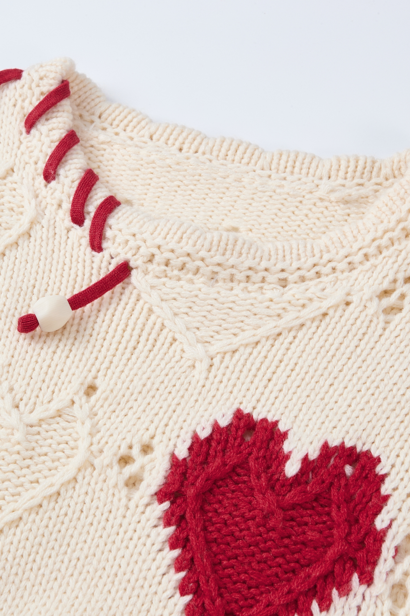 White openwork knit sweater