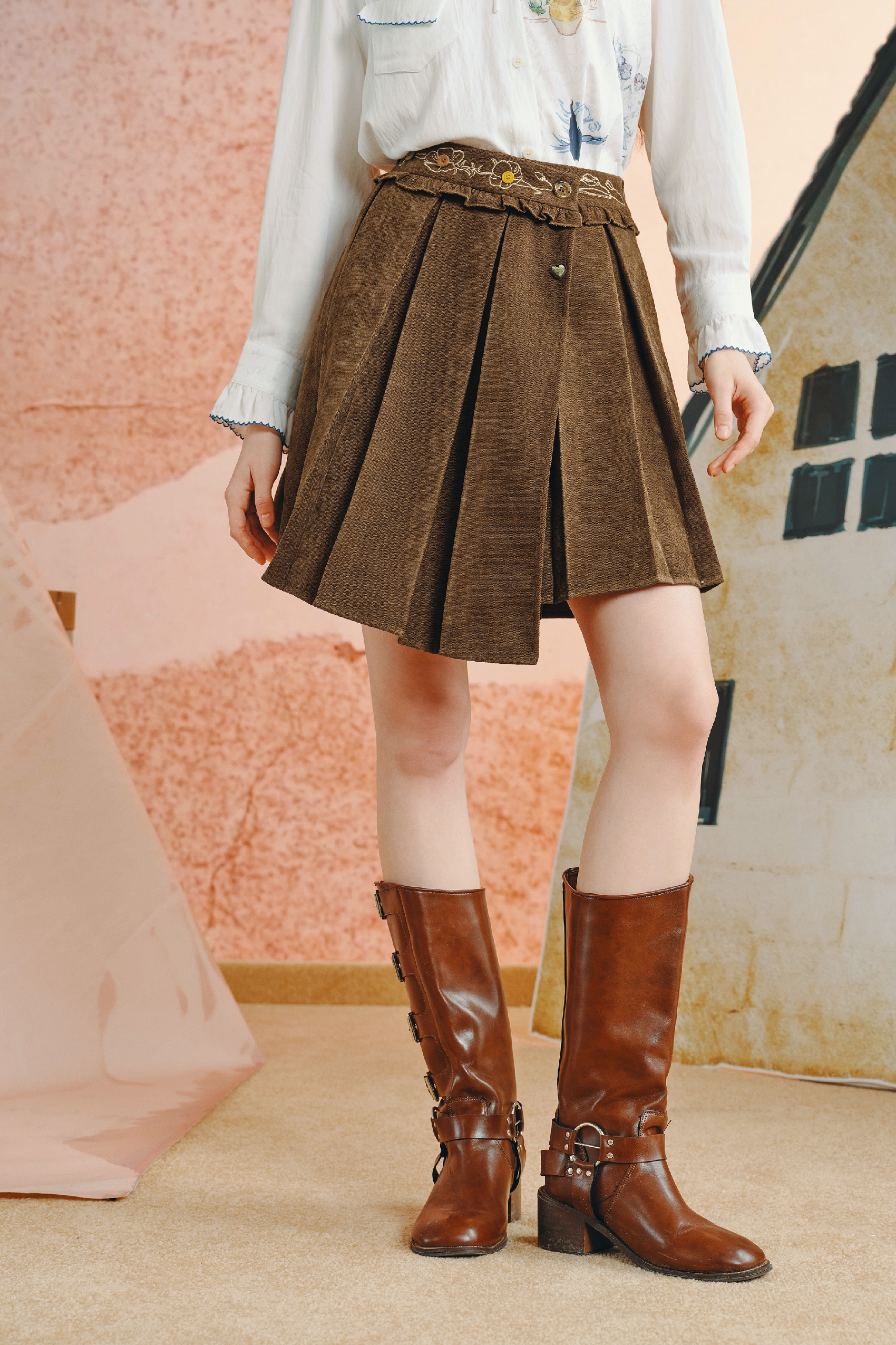 Asymmetrical pleated mini skirt