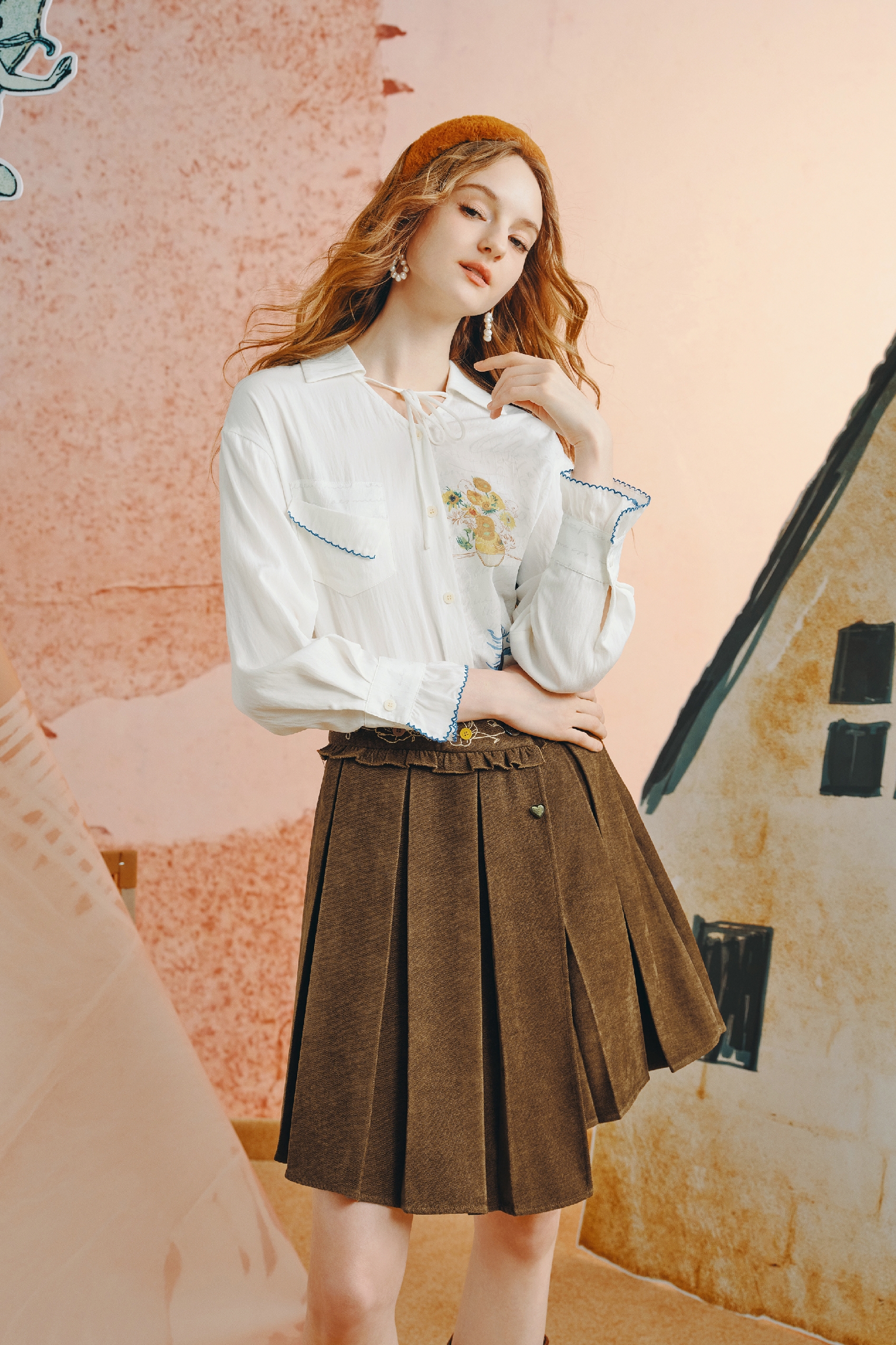 Asymmetrical pleated mini skirt