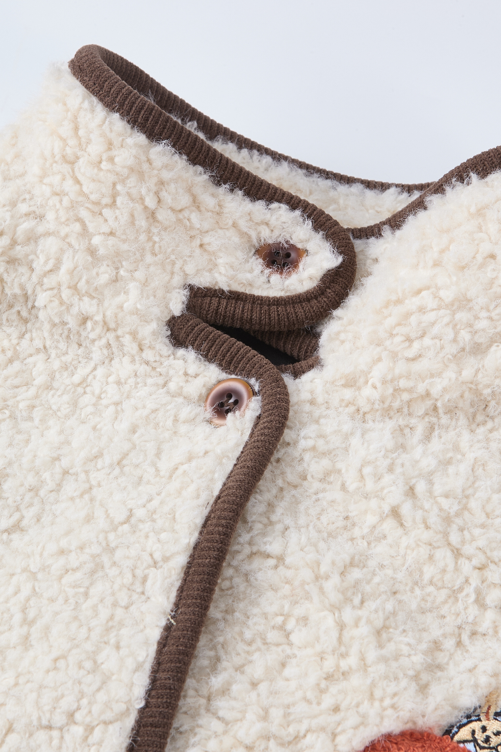 White embroidered lambskin coat