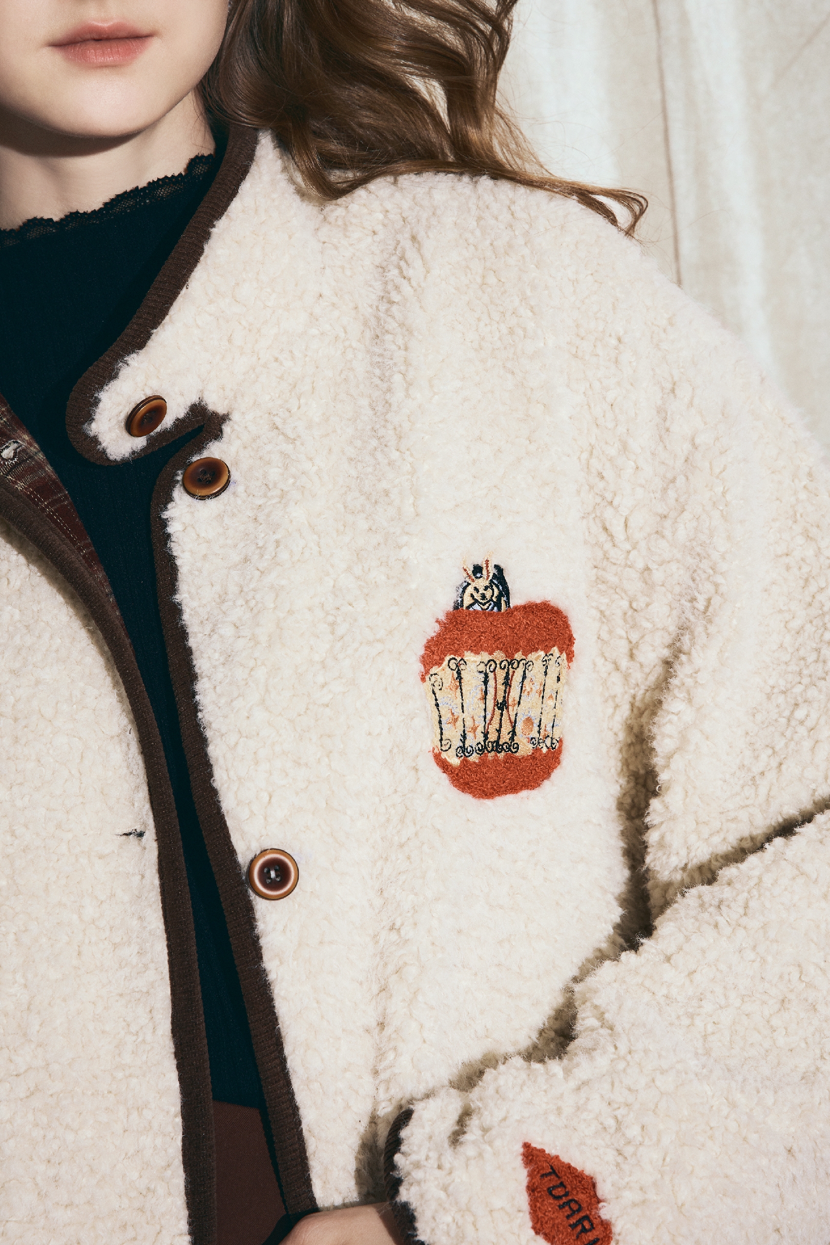 White embroidered lambskin coat