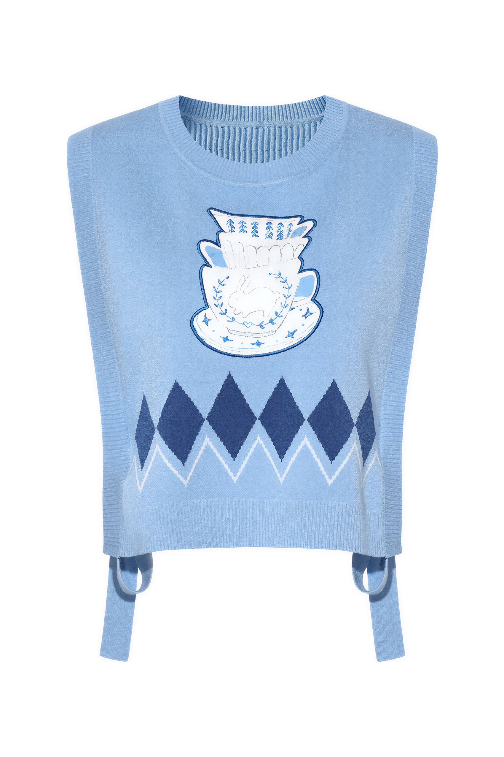 Short knitted vest worn over a tank top