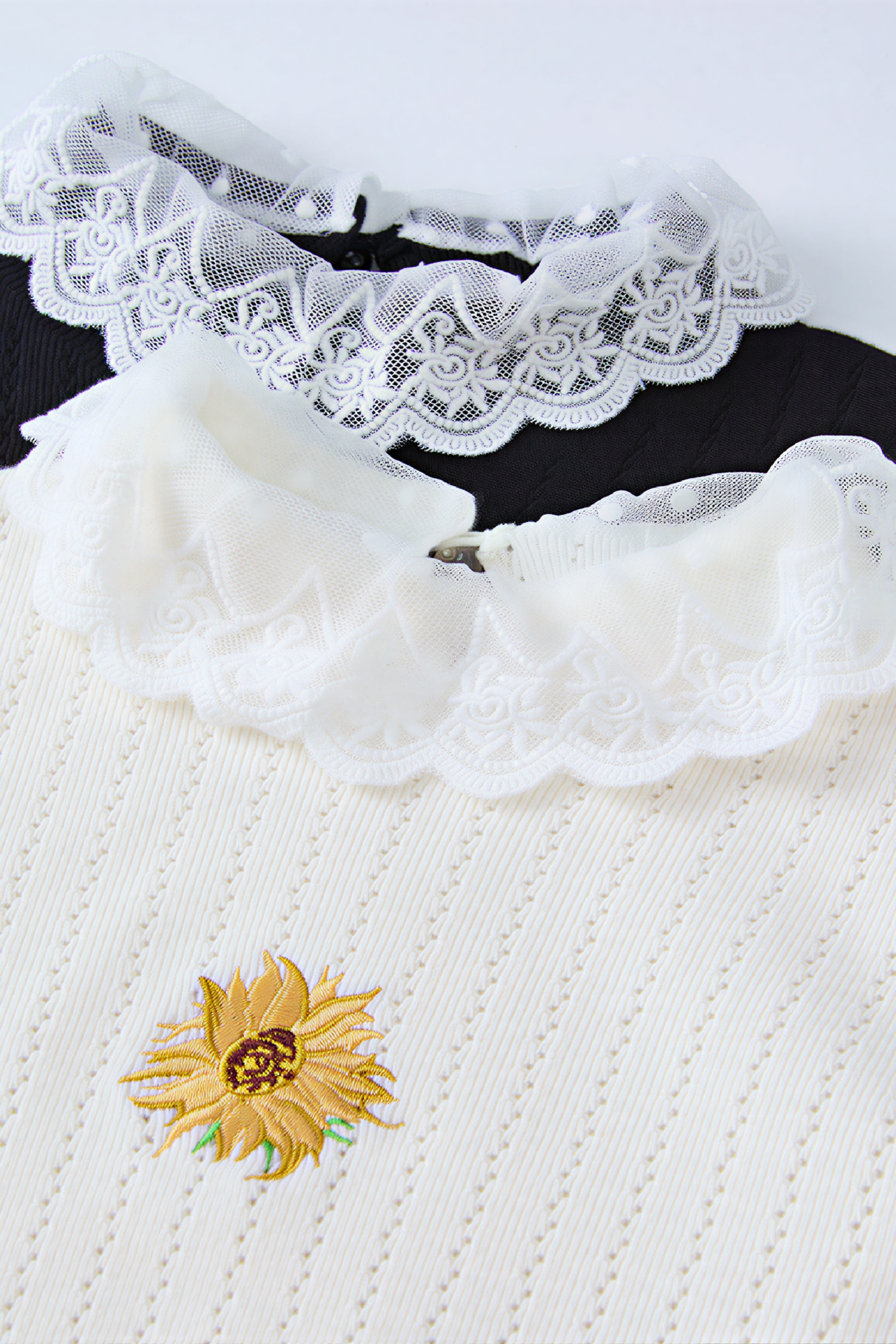 Worn with a fitted knit sweater underneath