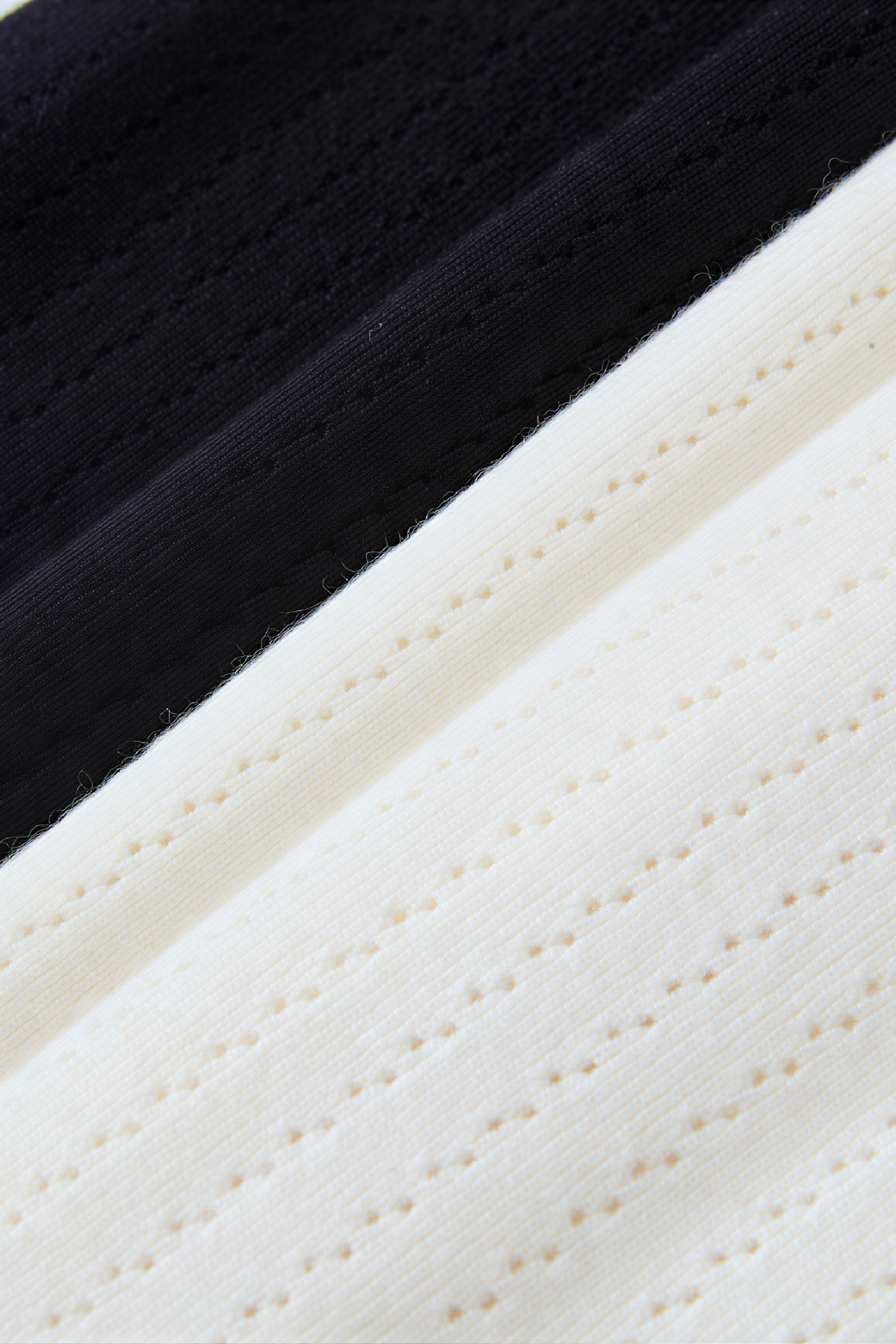 Worn with a fitted knit sweater underneath