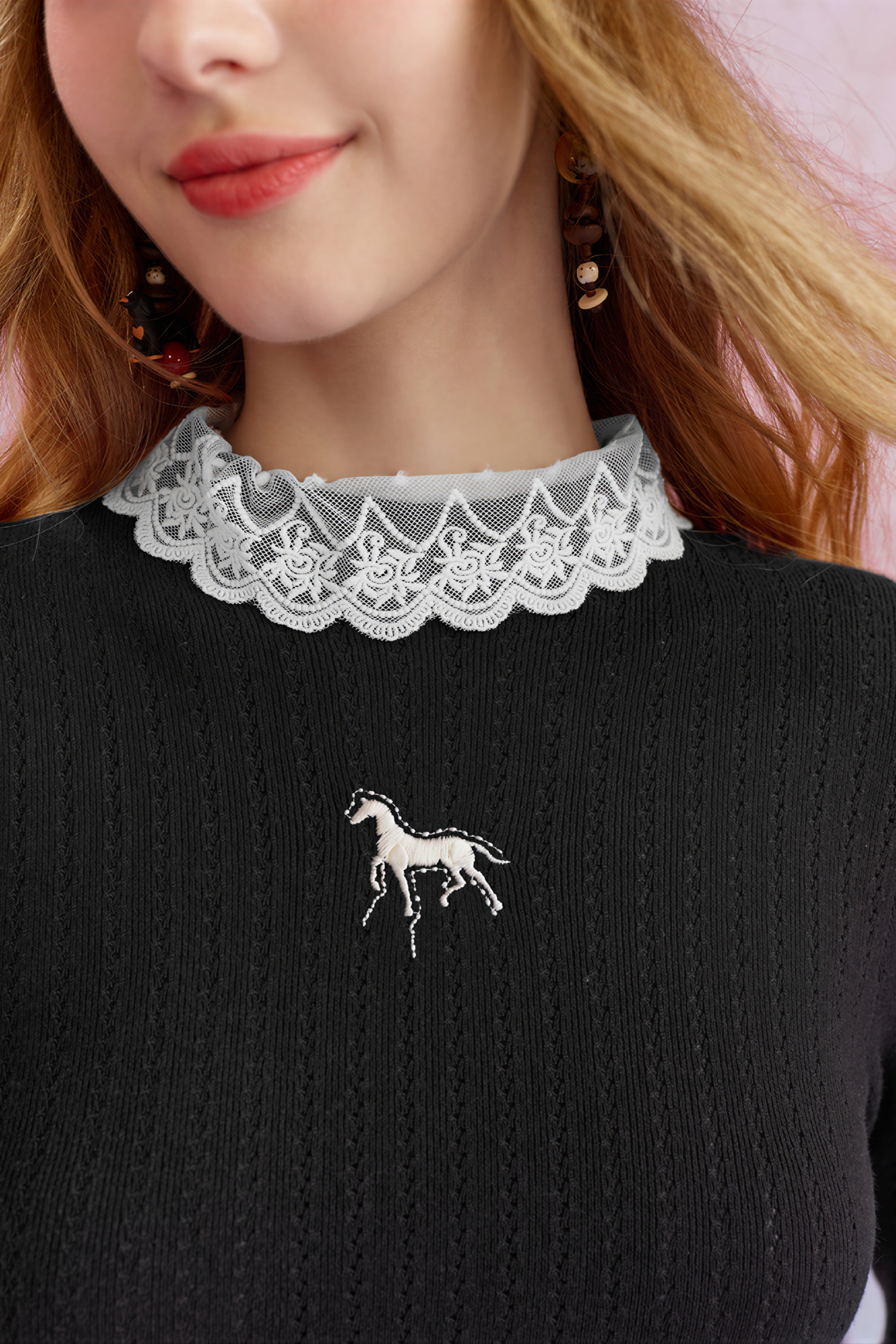 Worn with a fitted knit sweater underneath