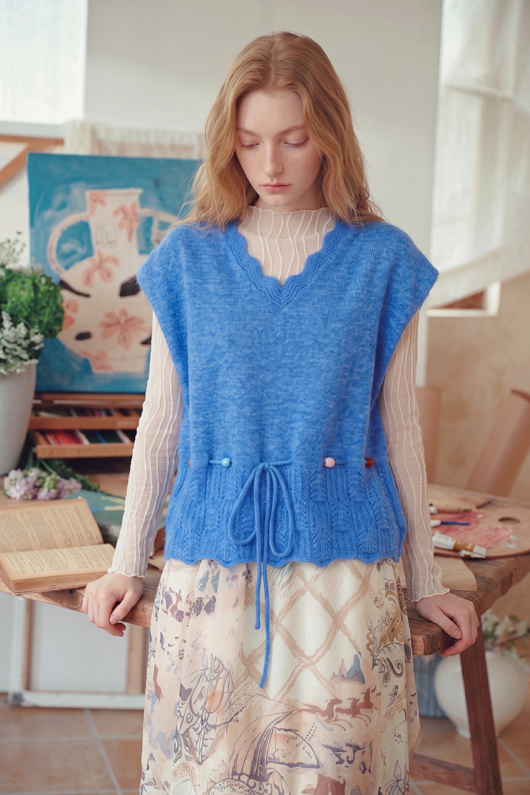 Blue V-neck tie-waist knit sweater vest for women