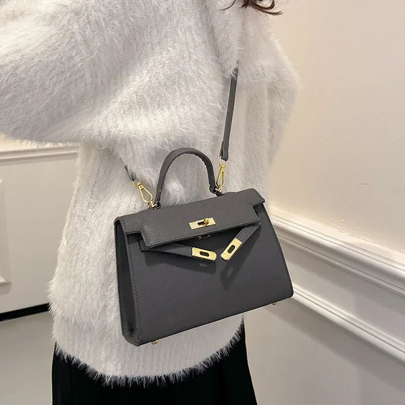 奢华真皮迷你包 | 橙色硬挺设计，搭配金色五金配件