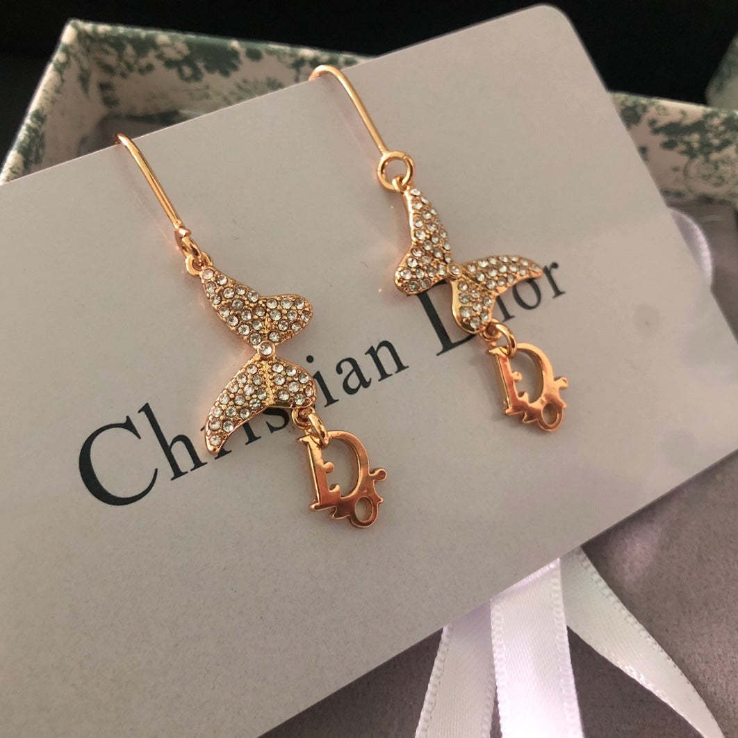 DI* butterfly diamond earrings