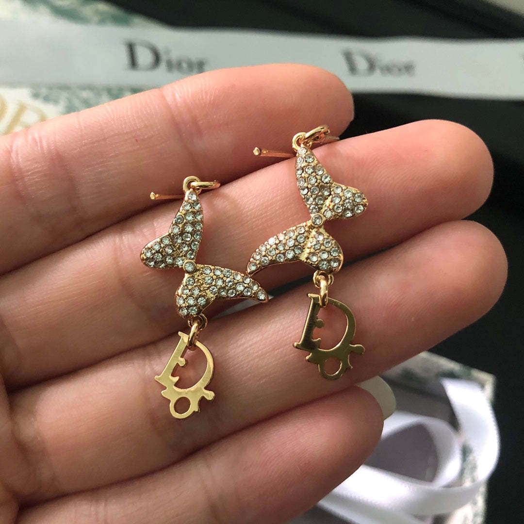 DI* butterfly diamond earrings