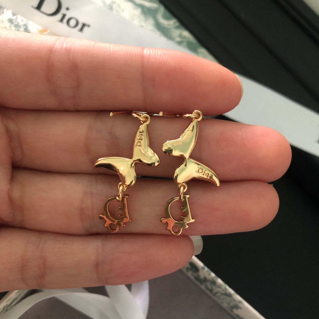 DI* butterfly diamond earrings