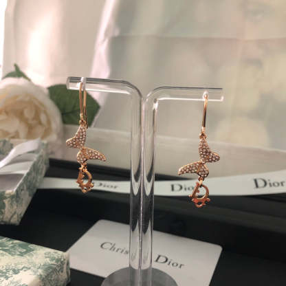 DI* butterfly diamond earrings