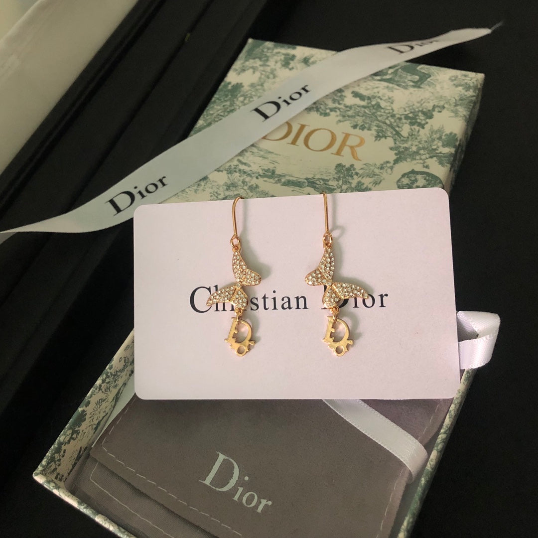 DI* butterfly diamond earrings